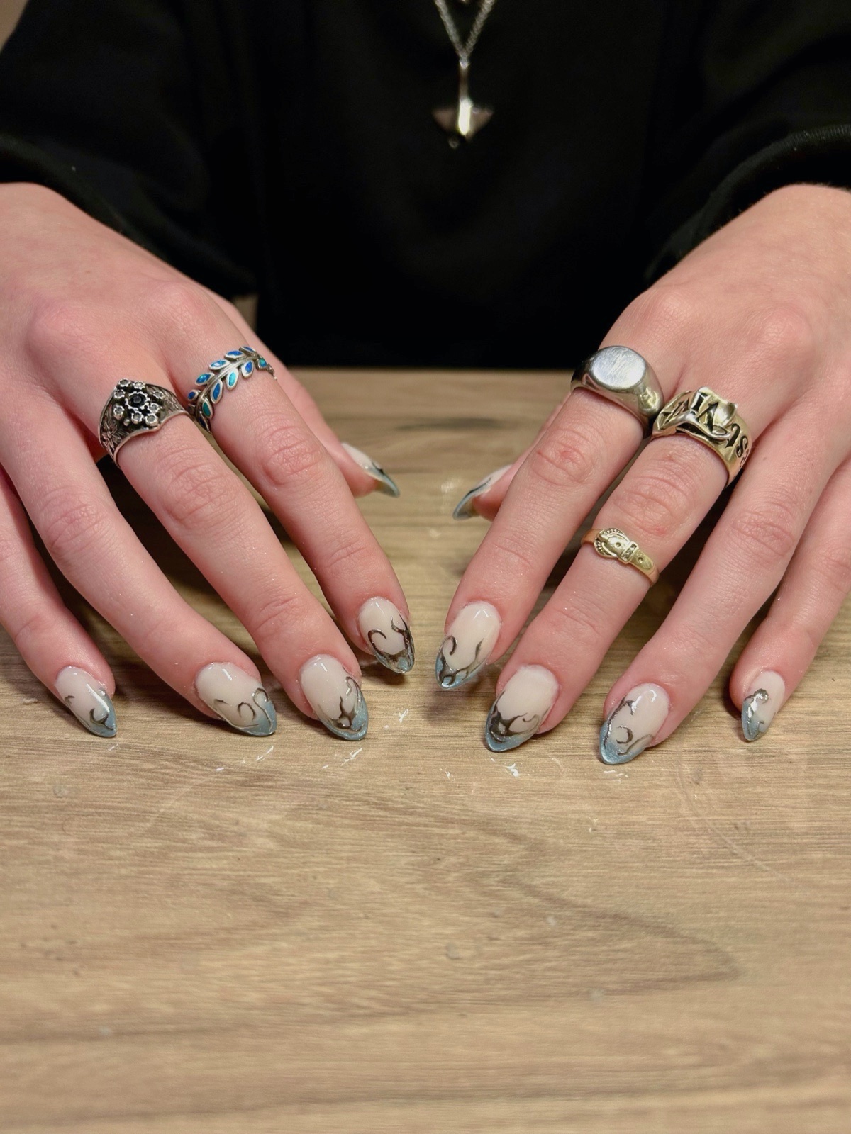 Milky white nails with smoky blue tip design